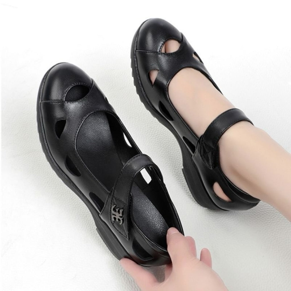 Zapatos de cuero huecos de suela blanda