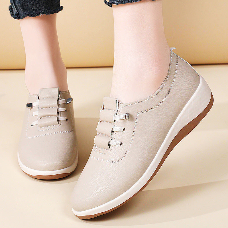 Zapatos de cuero de suela blanda sin cordones