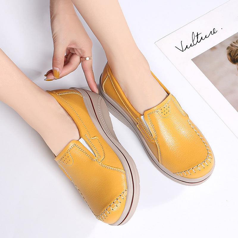 Zapatos de cuero de suela gruesa cosidos