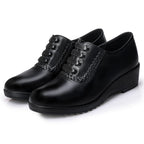 Tacones de cuña de cuero genuino