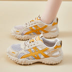 Zapatos casuales de malla con suela gruesa que realzan la altura