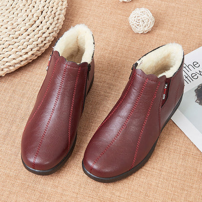 Botas planas de piel de terciopelo