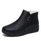 Botas planas de piel de terciopelo