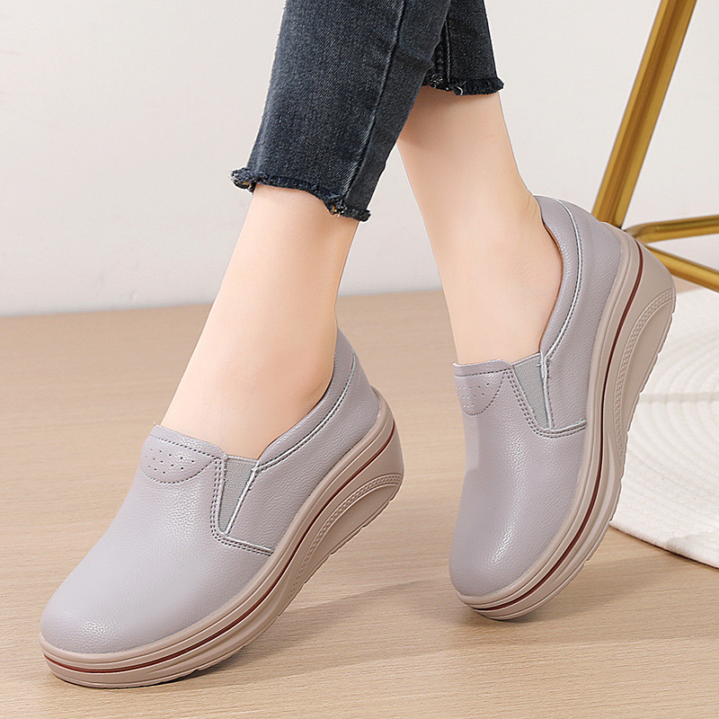 Zapatos de cuero elástico de suela gruesa