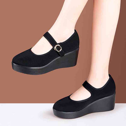 Zapatos de tela con suela blanda y tacón de cuña