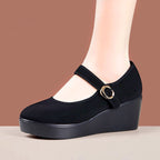Zapatos de tela con suela blanda y tacón de cuña