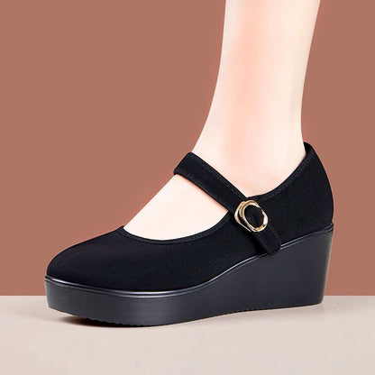 Zapatos de tela con suela blanda y tacón de cuña