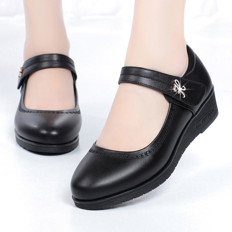 Zapatos de cuero de tacón medio con una sola tira