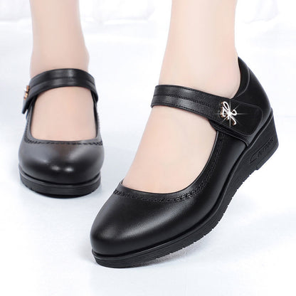 Zapatos de cuero de tacón medio con una sola tira