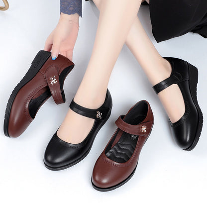 Zapatos de cuero de tacón medio con una sola tira