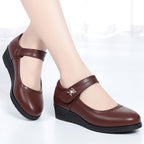 Zapatos de cuero de tacón medio con una sola tira