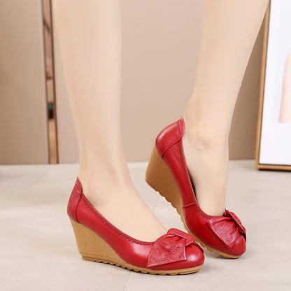 Zapatos de piel con cuña y lazo