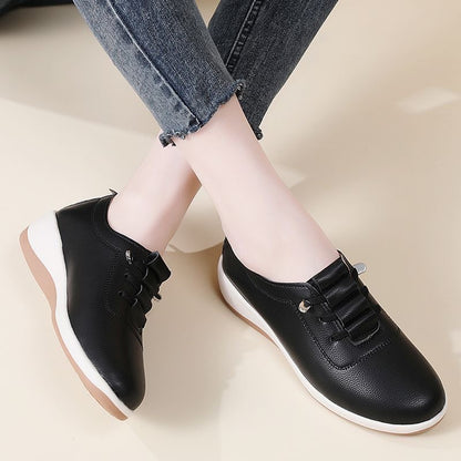 Zapatos de cuero de suela blanda sin cordones