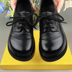 Zapatos de cuero suave con suela gruesa