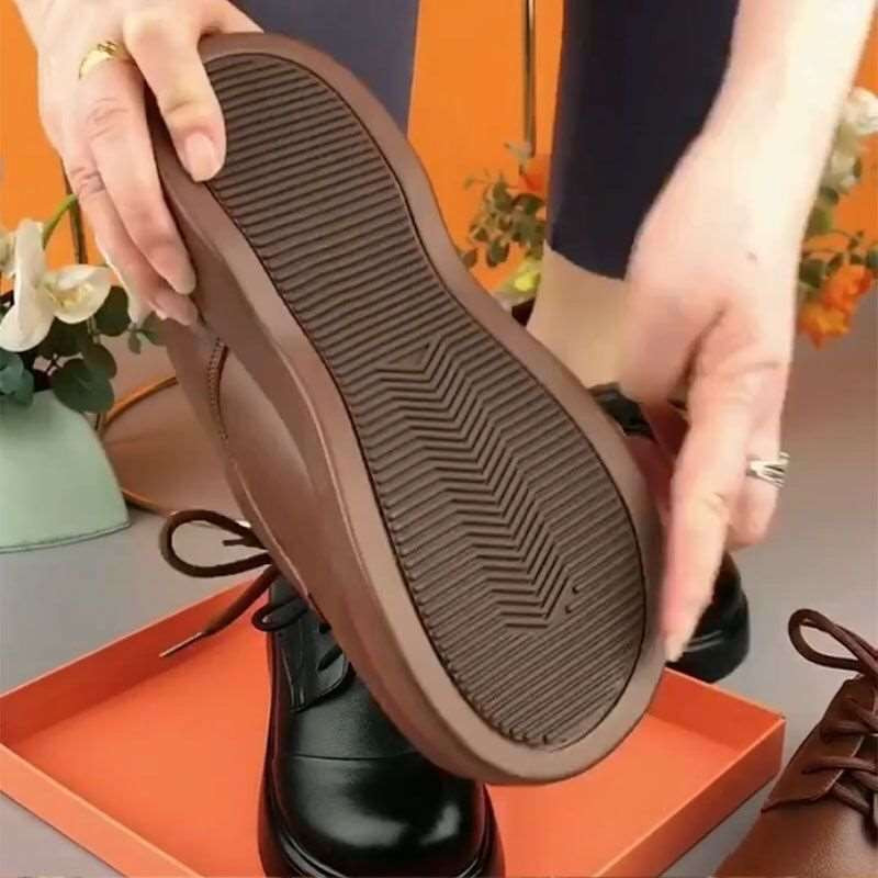 Zapatos de cuero suave con suela gruesa