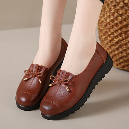 Zapatos de cuero con suela blanda y superficie blanda