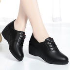 Tacones de cuña de piel suave
