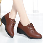 Tacones de cuña de piel suave