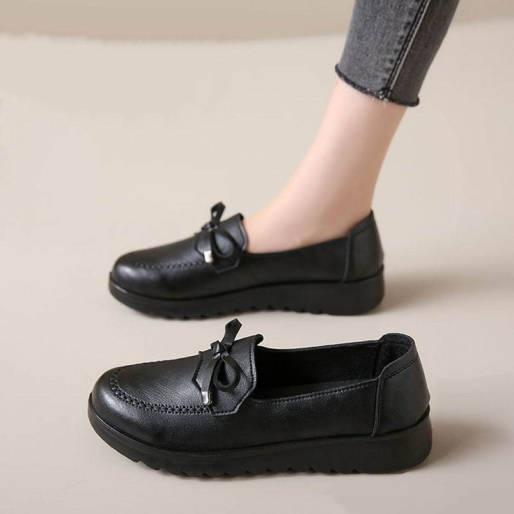 Zapatos de piel antideslizantes con suela blanda y punta redonda