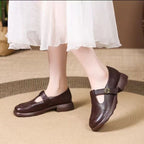 Zapatos planos de piel para mujer con punta redonda