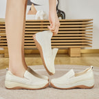 Zapatos de piel con suela blanda y tacón de cuña