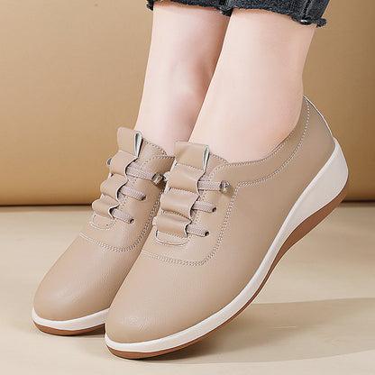 Zapatos de cuero de suela blanda sin cordones