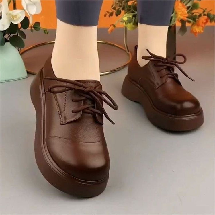 Zapatos de cuero suave con suela gruesa