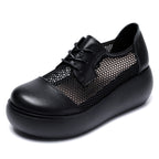 Zapatos de cuero con cordones y malla