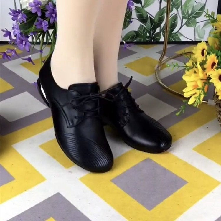 Zapatos de piel de tacón bajo con cordones y punta redonda