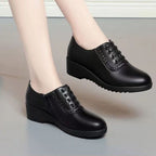 Tacones de cuña de cuero genuino