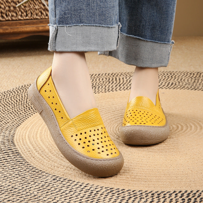 Zapatos de piel de punta redonda y suela blanda
