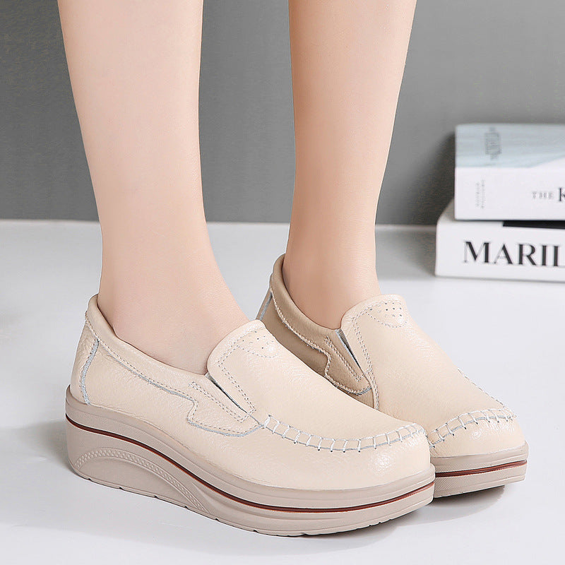 Zapatos de cuero de suela gruesa cosidos