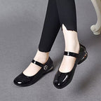 Zapatos suaves de charol con punta redonda