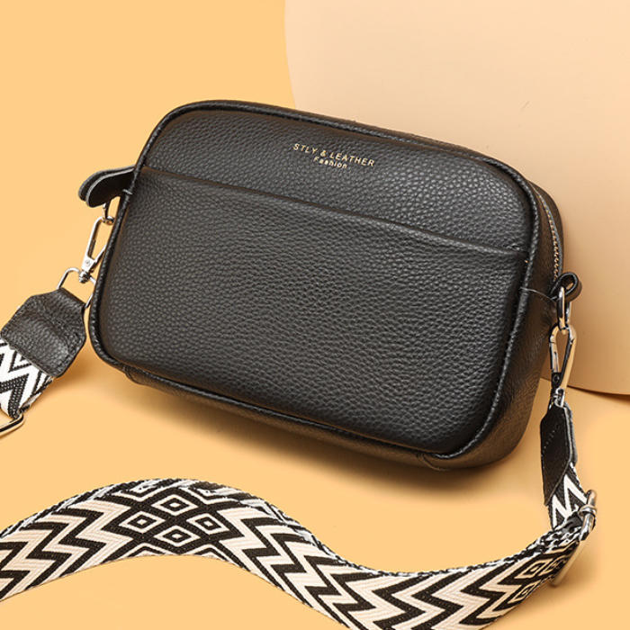 Bolso caído minimalista en cuero de primera capa