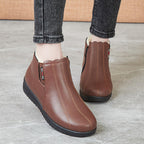 Botas planas de piel de terciopelo